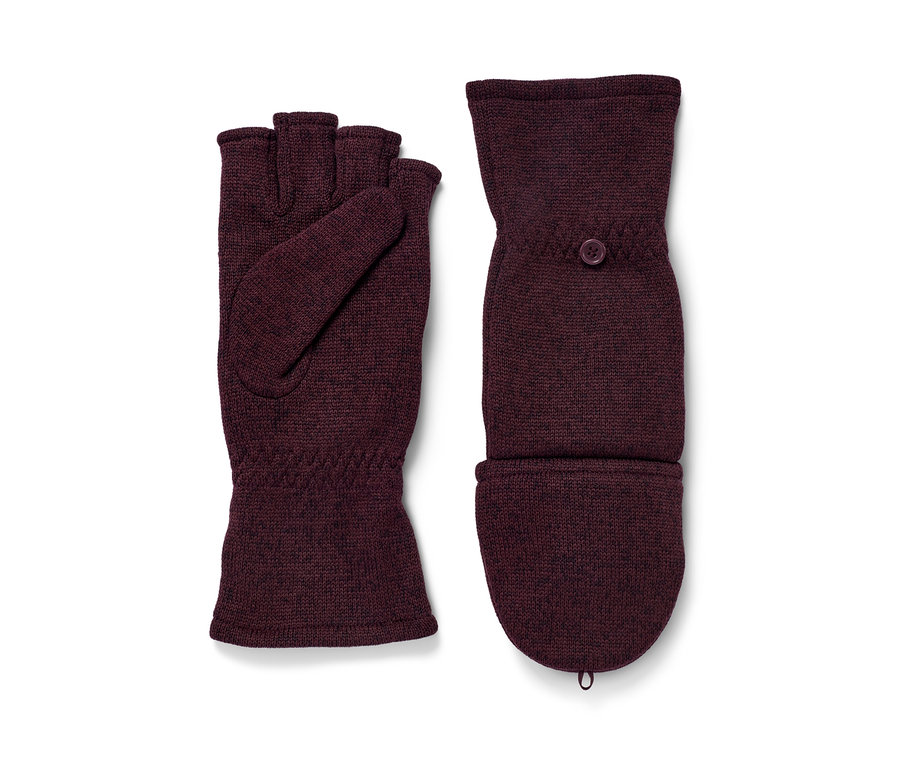 Deux moufles convertibles en maille polaire sont posées l'une à côté de l'autre.