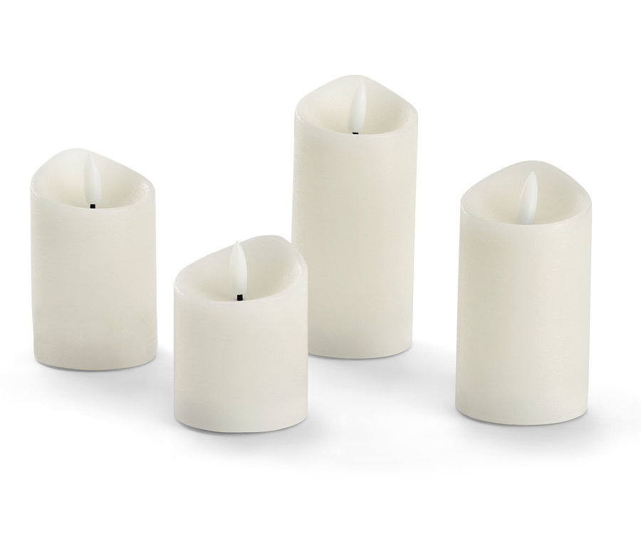 Quatre bougies à LED en cire véritable, crème.