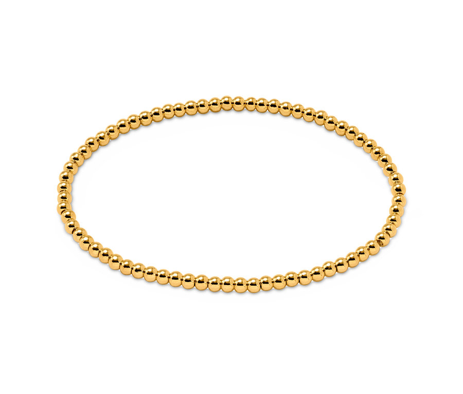Jeu de bracelets avec perles de verre, couleur or.