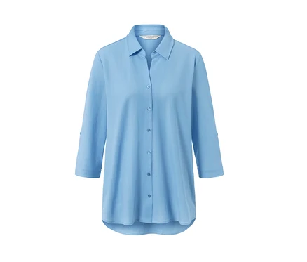 Chemisier en jersey piqué bleu clair avec manches trois-quarts et boutons.