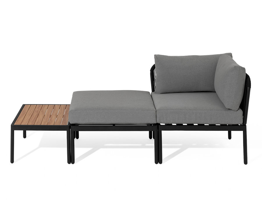 Lounge modulaire avec tressage textile avec des coussins gris et une table en bois.