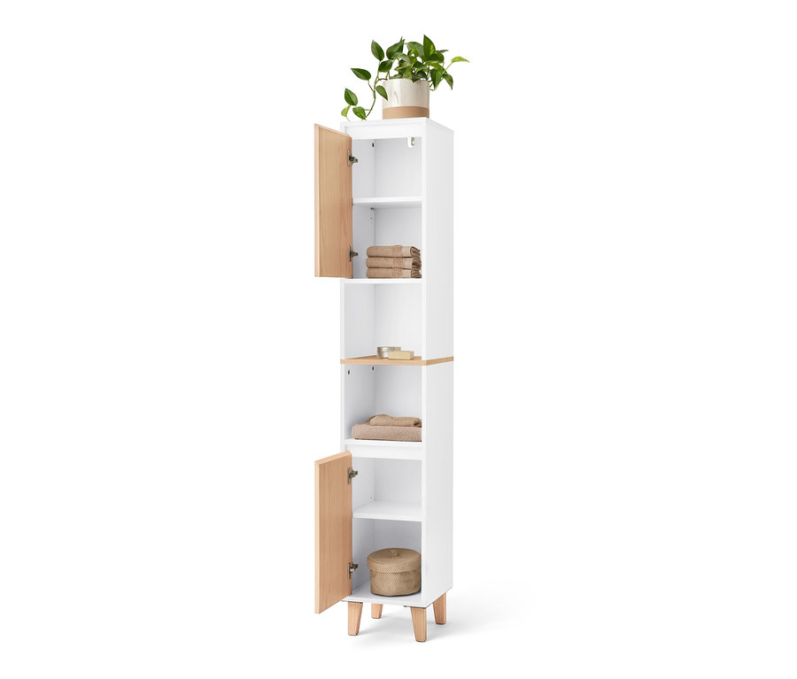 Une armoire haute de salle de bain avec un compartiment ouvert et 2 portes, avec des serviettes et une plante.