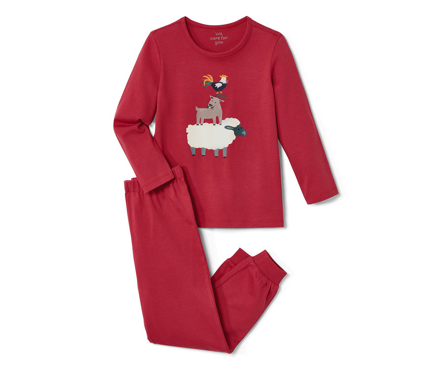 Pyjama rouge pour tout-petit avec imprimé animalier.