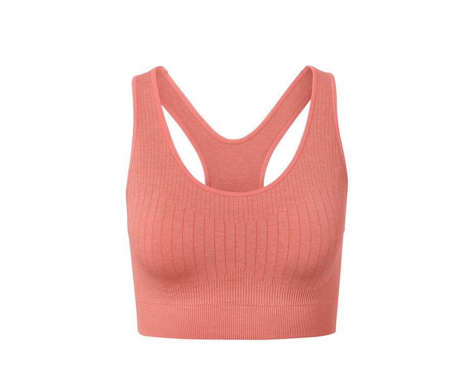 Gros plan d'une brassière de sport sans coutures vieux rose.