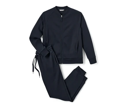 Survêtement d’intérieur bleu marine avec veste zippée et pantalon à cordon.