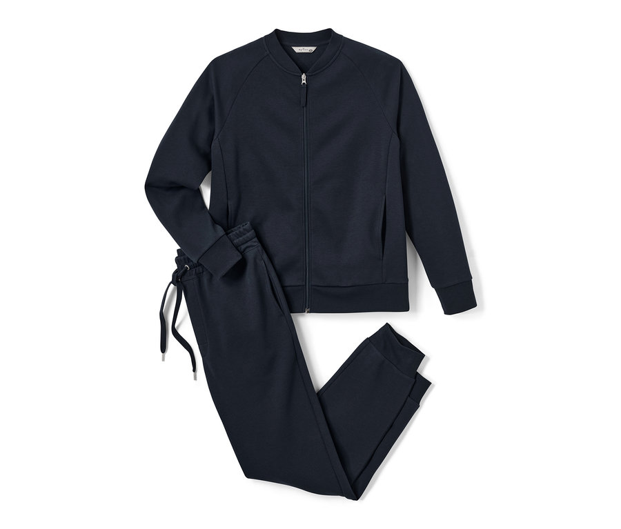 Survêtement d’intérieur bleu marine avec veste zippée et pantalon à cordon.