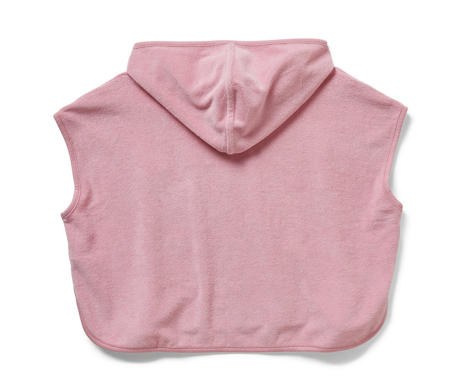 Gros plan sur un poncho rose en éponge avec une capuche, princesse.