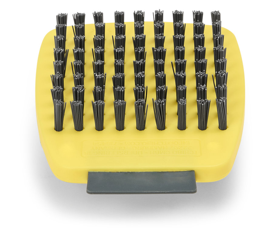 Brosse jaune avec des poils noirs.