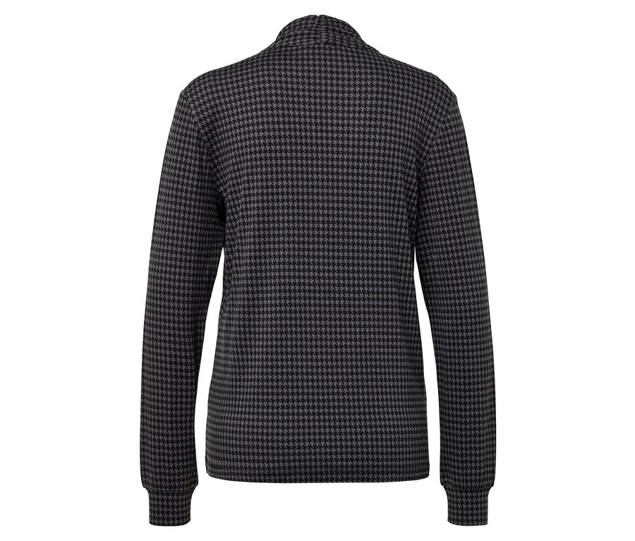 Détail du dos d'un pull pied-de-poule en noir et gris.