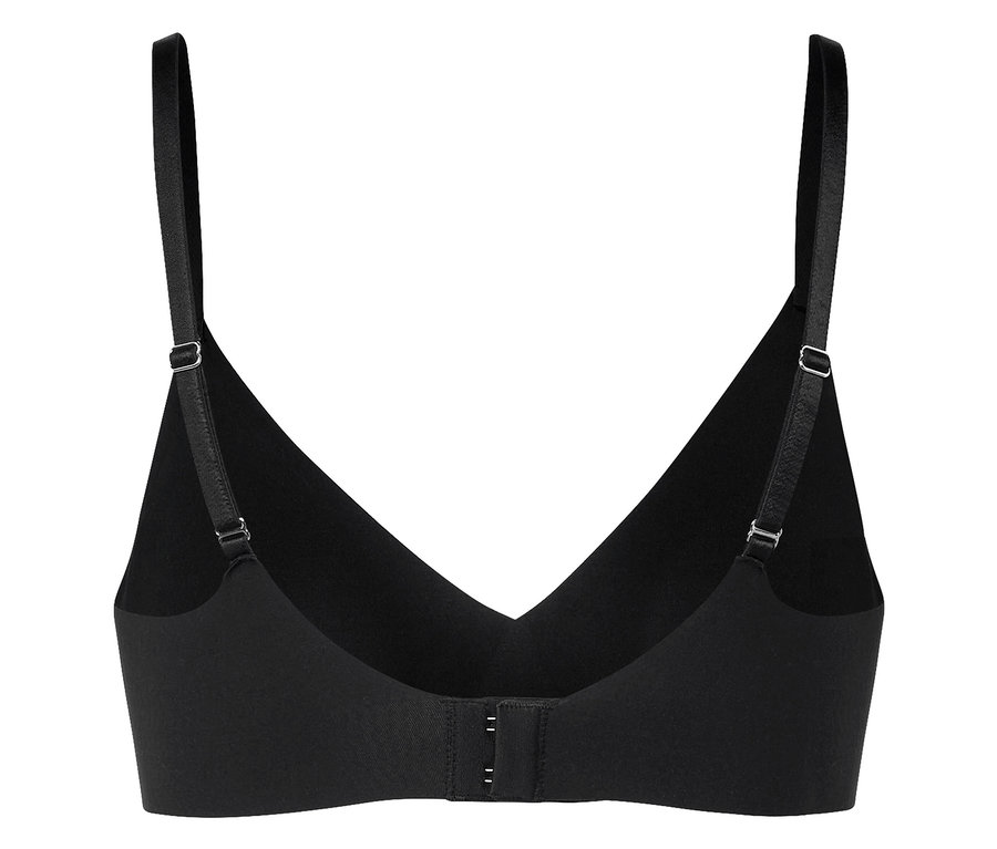 Détail d'un soutien-gorge noir avec bretelles réglables et fermeture à agrafes.