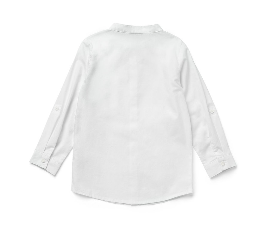 Vue arrière d'une chemise pour enfant blanche à manches longues.