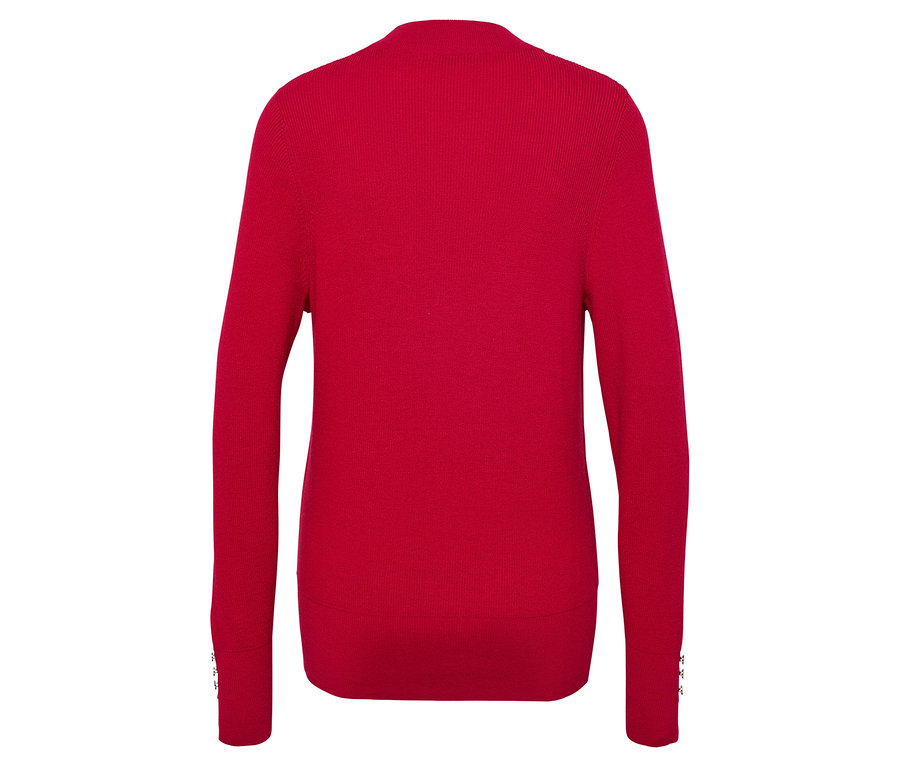 Détail du dos d'un pull rouge.