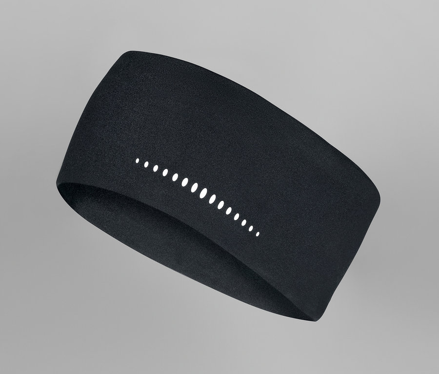Bandeau de sport noir avec éléments réfléchissants sur fond gris.