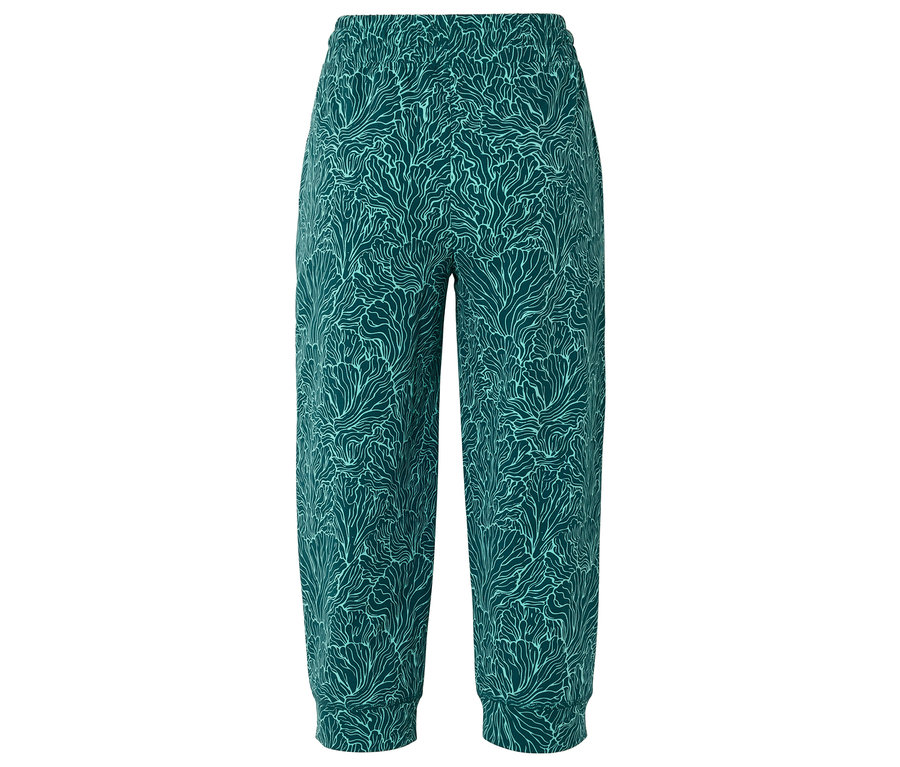 Pantalon vert avec motif abstrait.