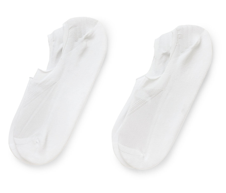 Deux socquettes blanches côte à côte sur fond blanc.
