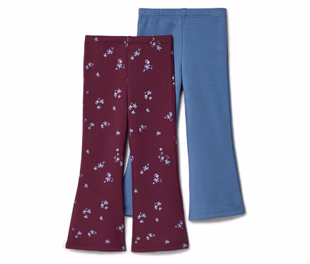 Deux paires de leggings évasés pour enfants. L'une est bordeaux avec un motif floral bleu clair, et l'autre est unie bleu clair. Elles sont présentées sur un fond blanc.