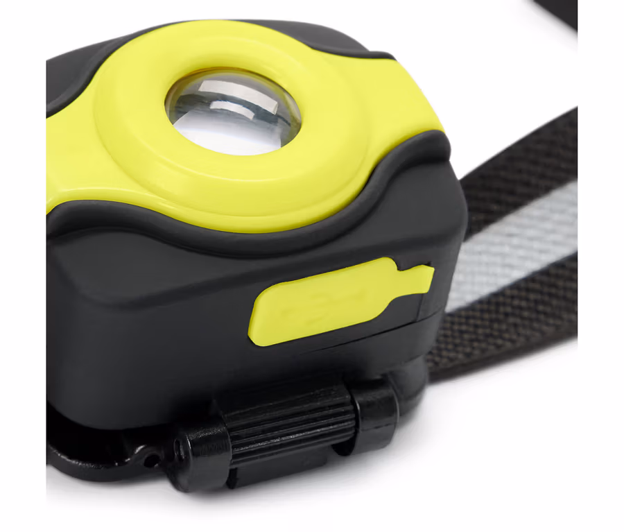 Gros plan d'une lampe frontale compacte.