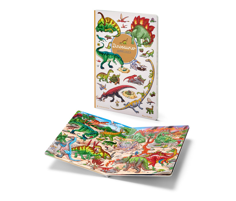 Deux livres avec des illustrations de dinosaures. Un livre est fermé et debout, l'autre est ouvert et posé.