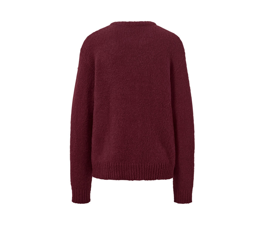 Pull en grosse maille rouge bordeaux avec de la laine.