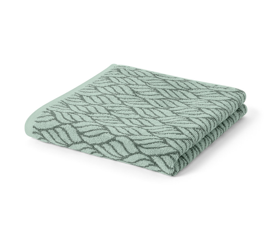 Drap de bain en jacquard plié.