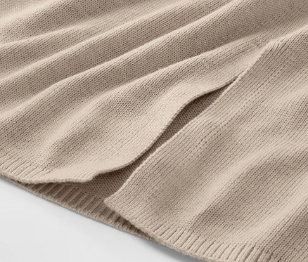 Détail d'une jupe tricotée.