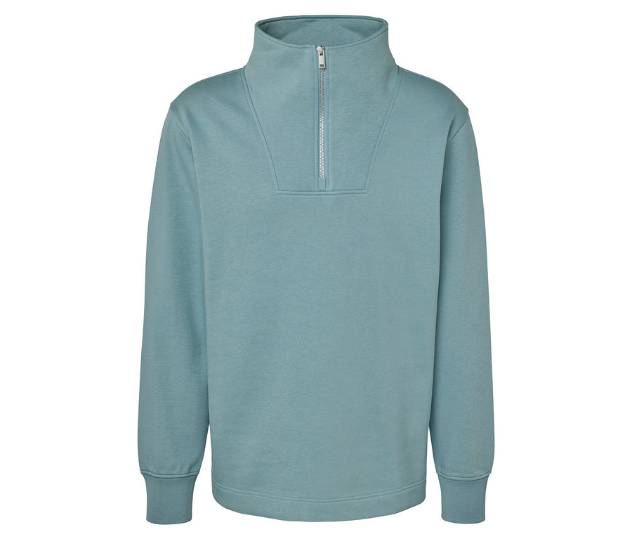 Sweat-shirt bleu clair avec fermeture éclair courte.