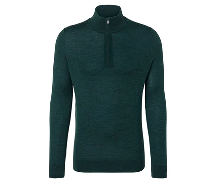 Pull vert foncé avec fermeture éclair au col.