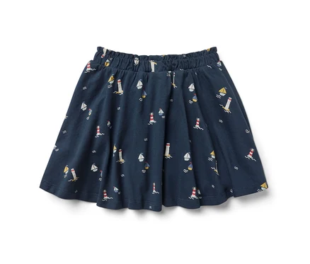 Jupe en jersey marine pour enfants avec des phares et des voiliers.