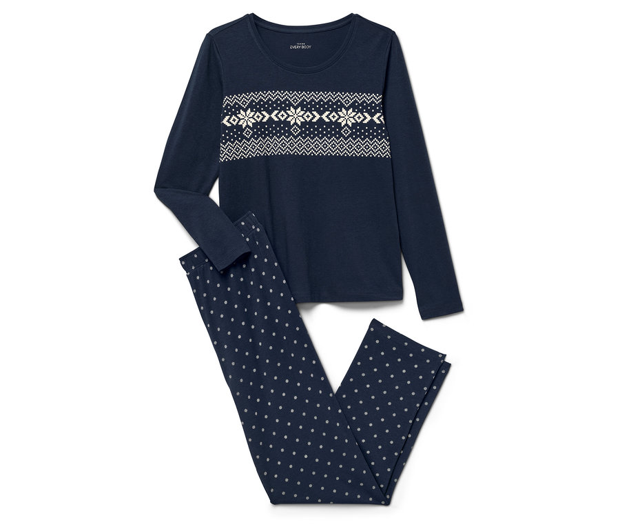 Pyjama bleu marine avec un haut à manches longues à motif de flocons de neige et un pantalon à pois.