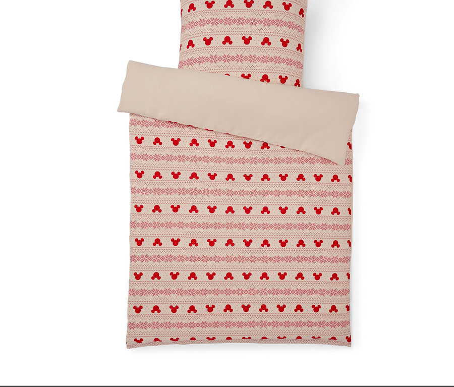 Linge de lit avec motif Mickey Mouse sur fond blanc.