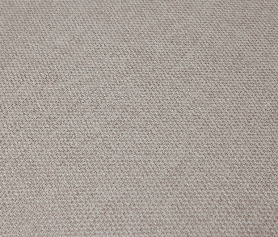 Gros plan de la texture d'un fauteuil avec accoudoirs et cadre en bois.