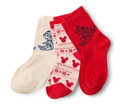 Trois paires de chaussettes »Mickey and Friends« sont empilées.
