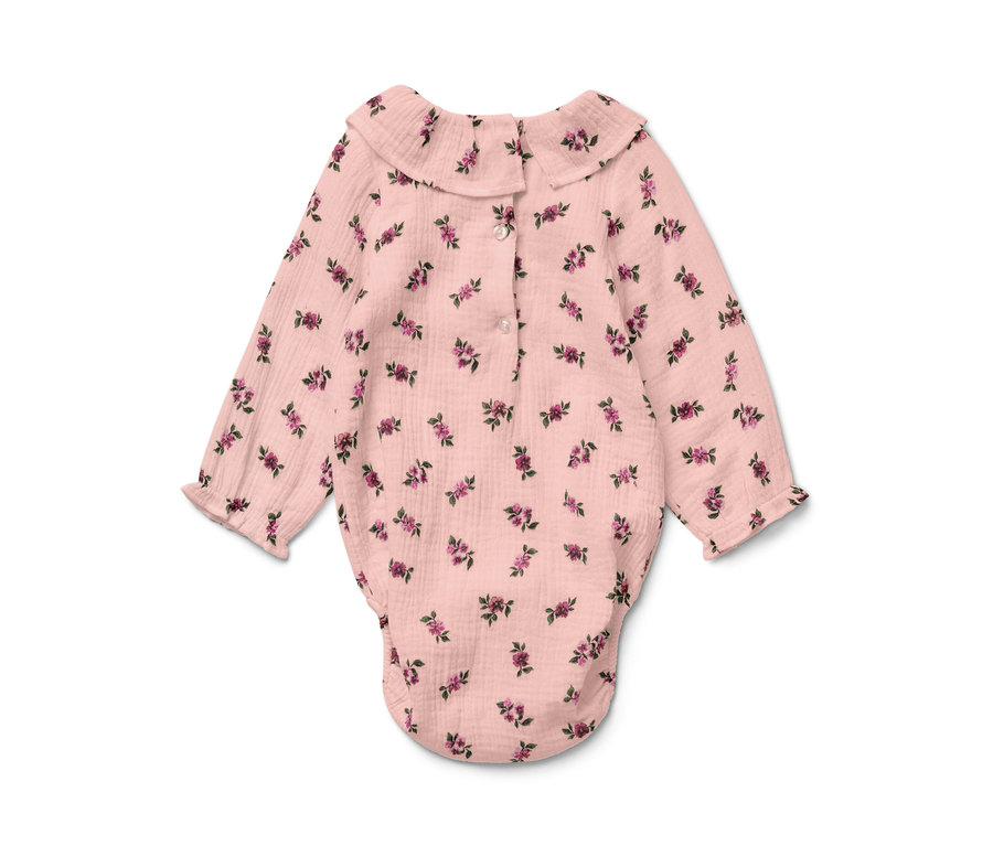 Body en mousseline pour bébé rose avec motif floral.