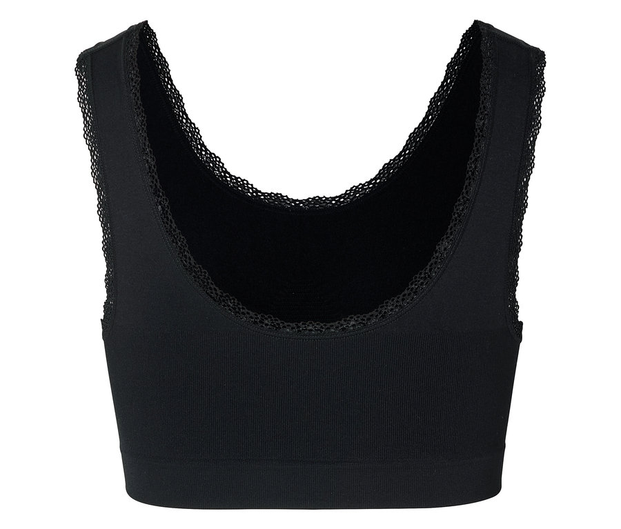Bustier noir côtelé avec bordure en dentelle à l'encolure et aux emmanchures.