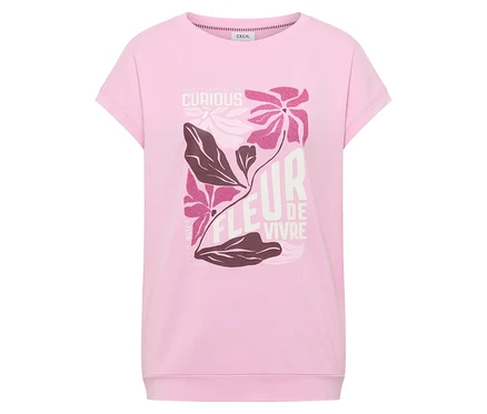Le T-shirt à motif floral CECIL rose est posé sur un fond blanc.