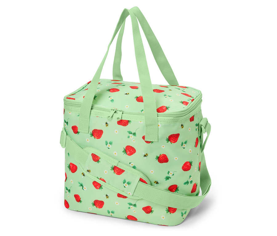 Un sac isotherme vert clair avec des fraises et des abeilles, avec des poignées et une bandoulière.