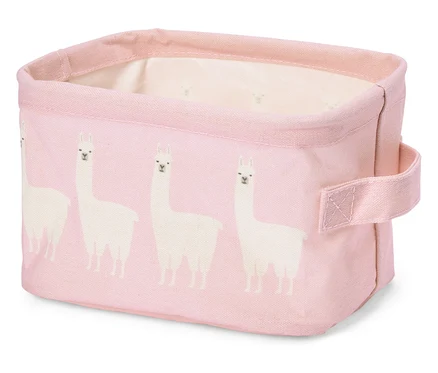 Boîte en tissu rose avec motifs de lamas blancs et poignée.