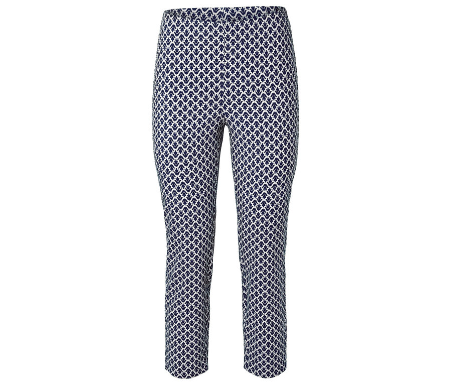 Pantalon bleu et blanc à motif de feuilles.