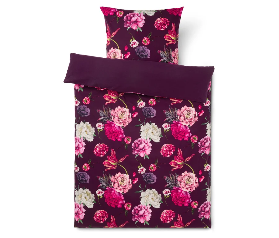 Parure de lit violet foncé avec housse de couette et taie d'oreiller, motif floral vif de pivoines roses, fuchsia et blanches.