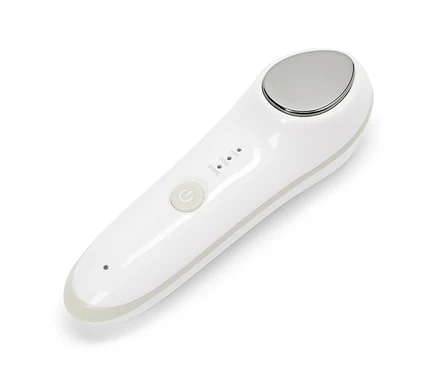 Appareil de beauté blanc avec tête en métal et boutons pour régler la température et le mode sonique.