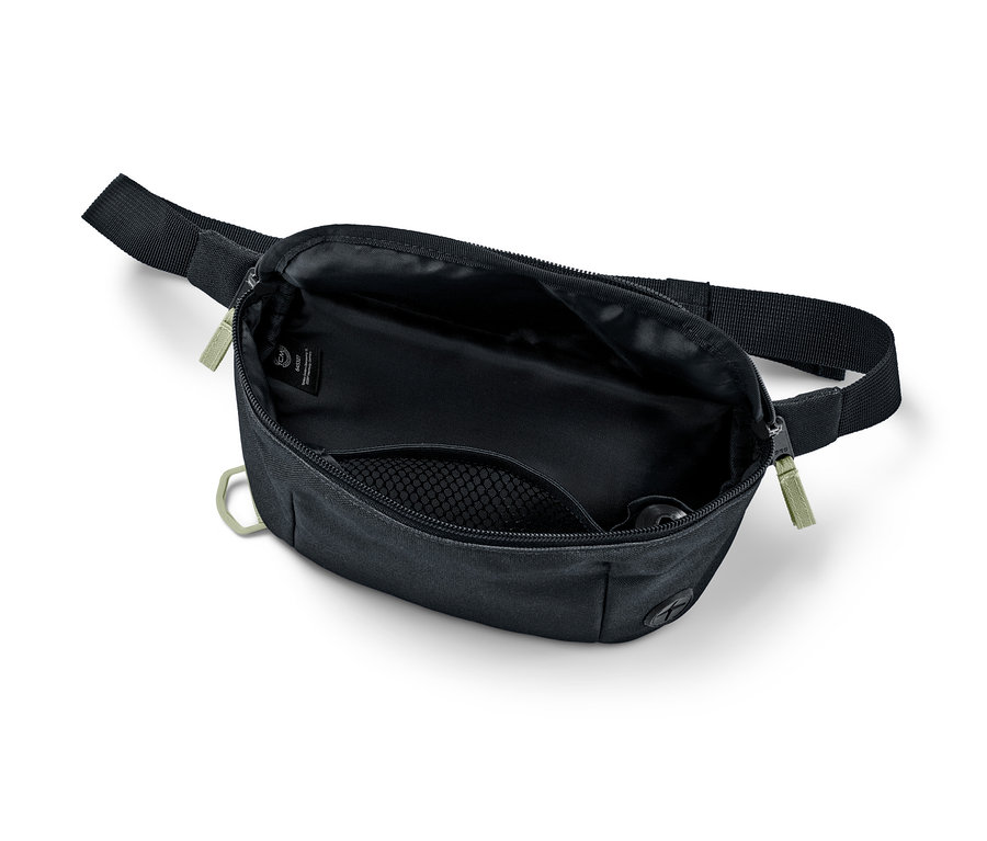 Sac de promenade pour chien noir ouvert avec une sangle noire et une fermeture éclair vert olive.