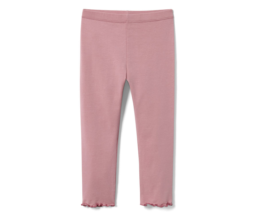 Legging pour enfant rose sur fond blanc.