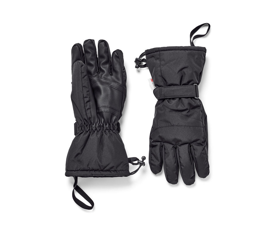 Deux gants de ski noirs sont posés côte à côte sur un fond blanc.