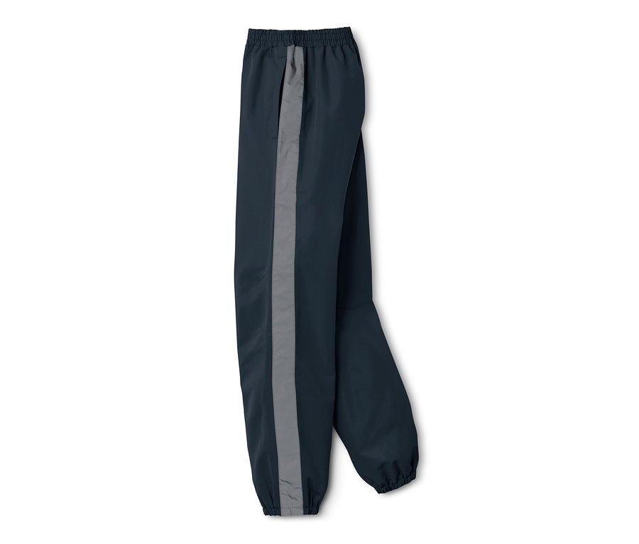 Pantalon de pluie pour enfant bleu marine avec une bande réfléchissante sur le côté.
