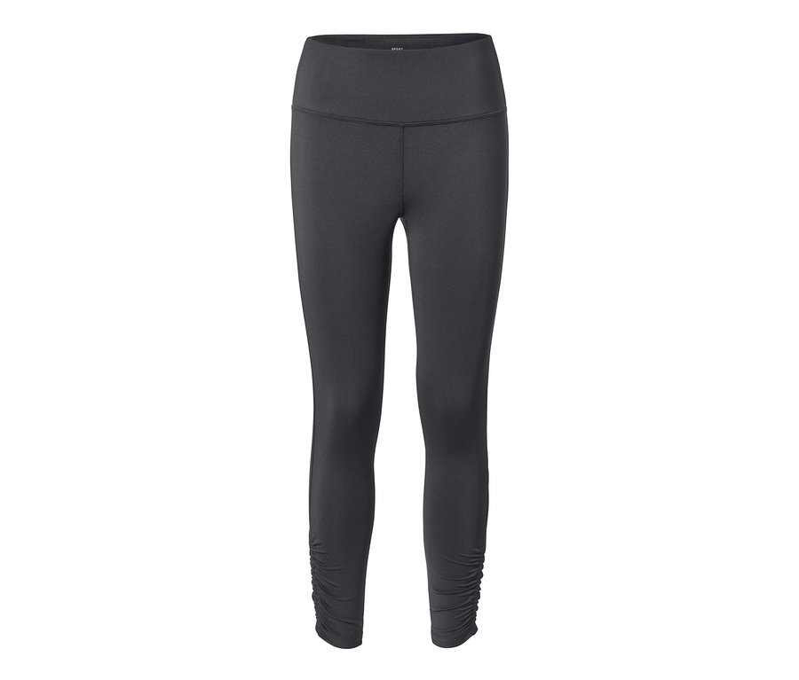 Un legging de sport 7/8 noir sur fond blanc.