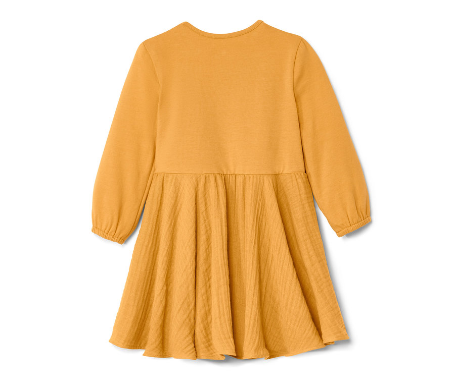 Robe tissée jaune à manches longues pour bébé.