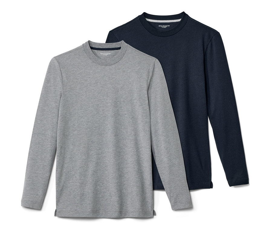 Deux t-shirts à manches longues, un gris et un bleu marine, sont placés l'un à côté de l'autre.