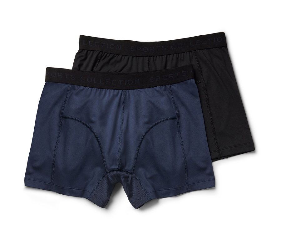 Deux boxers de sport, un bleu marine, un noir.