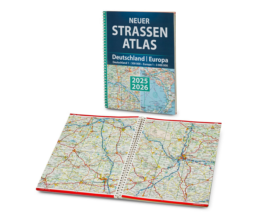 Un atlas routier ouvert est représenté. Livre : nouvel atlas routier Allemagne/Europe 2025/2026 sur le dessus.