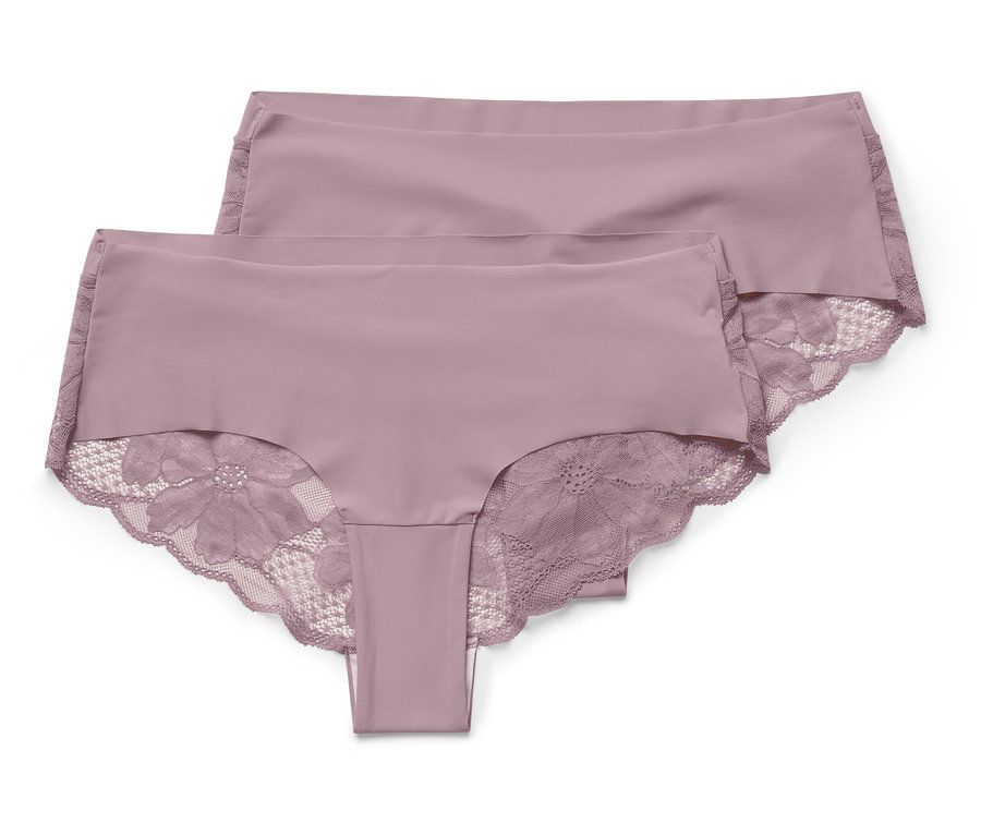 Deux culottes violettes avec de la dentelle florale sont posées l'une sur l'autre.